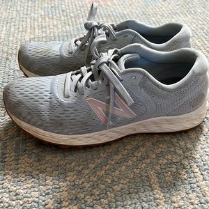 New balance women’s 6.5 size running shoes in baby blue.  Worn once!